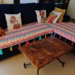 L shape multicolored sofa cover with tassels