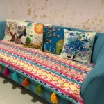Three-seater multicoloured sofa cover